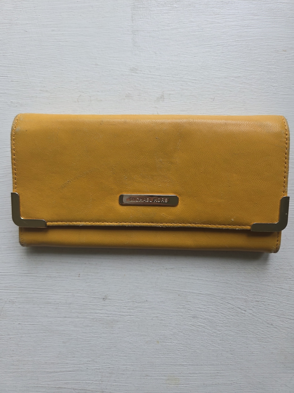 MICHAEL KORS Mustard Yellow Leather Flap Wallet with Gold Accents